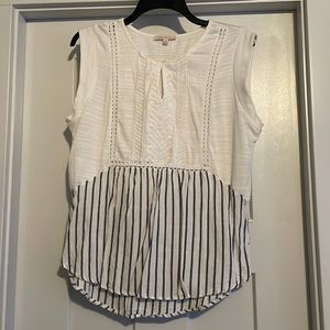 Skies are blue.  Blouse. Size M